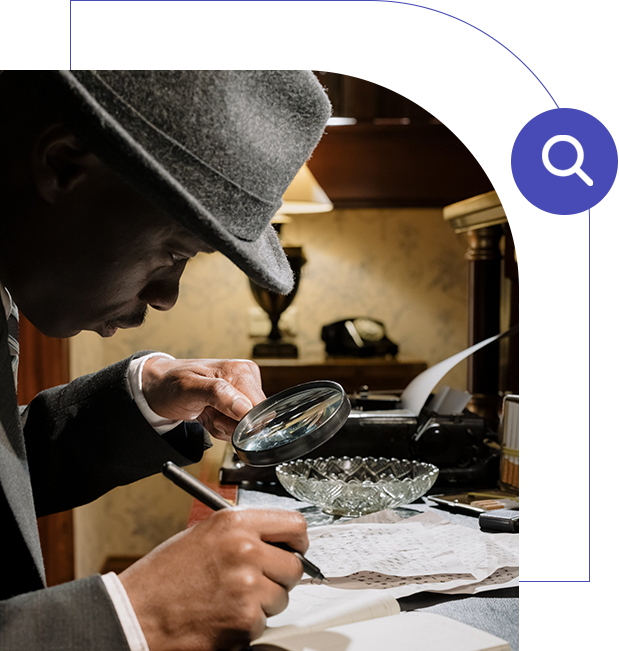 A man looking at papers with magnifying glass.